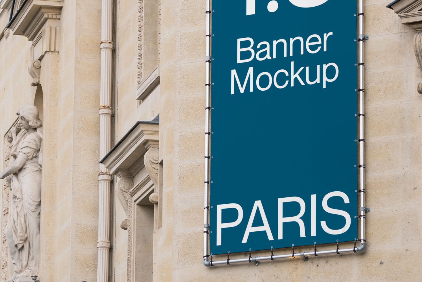 Outdoor banner mockup on a classic building with sculptures, blue sign with sample text for design presentations, Paris.